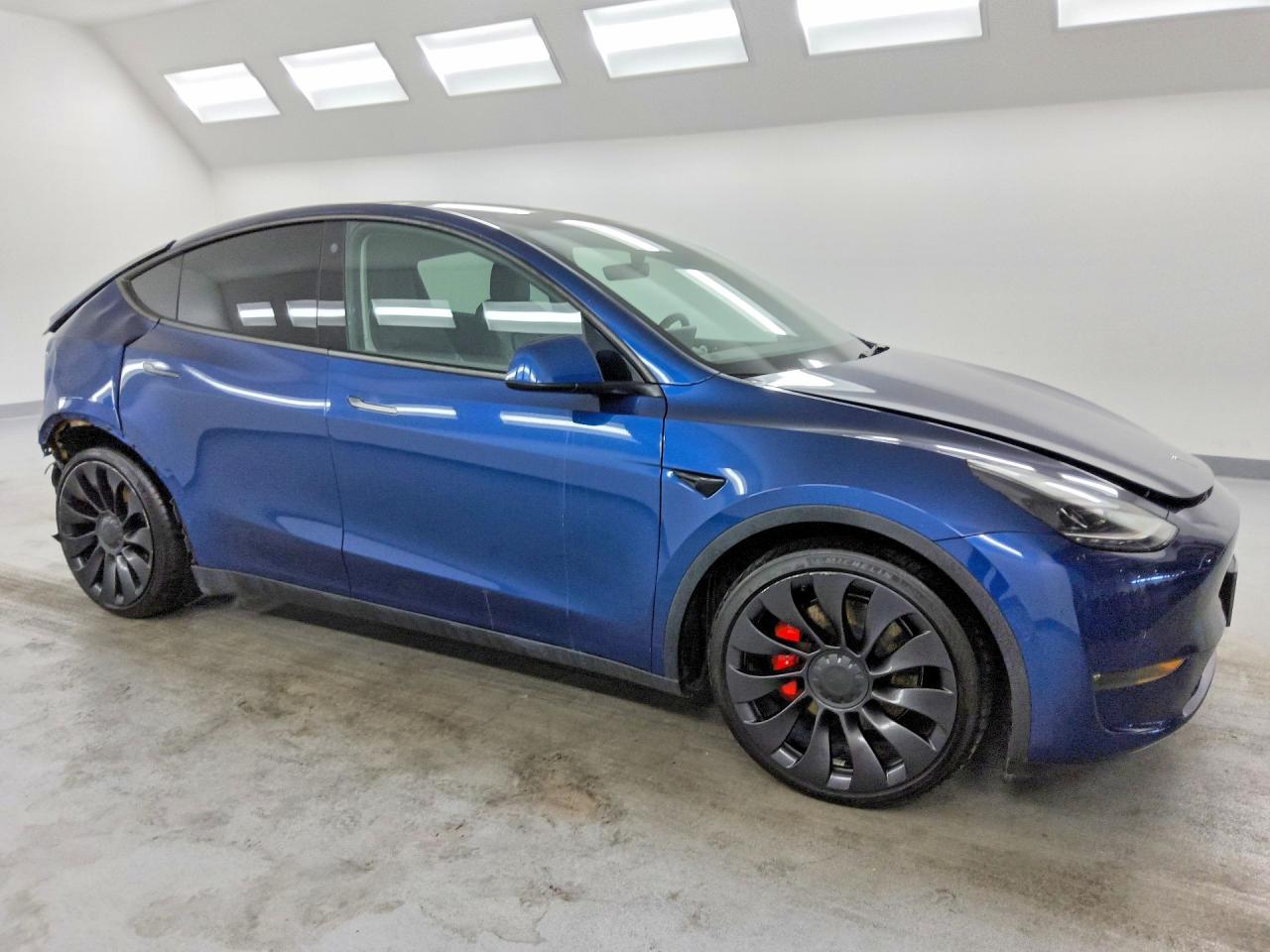 7SAYGDEF6NF389239 · 2022 TESLA MODEL Y · 4/13