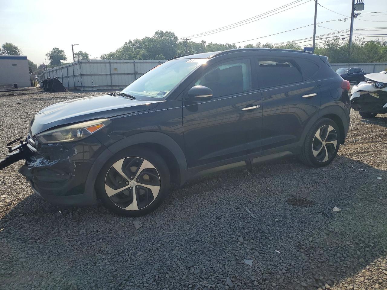KM8J3CA27GU059042 · 2016 HYUNDAI TUCSON