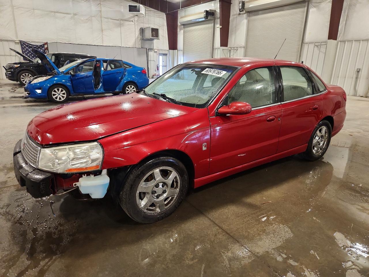 1G8JU54FX3Y507475 · 2003 SATURN L200