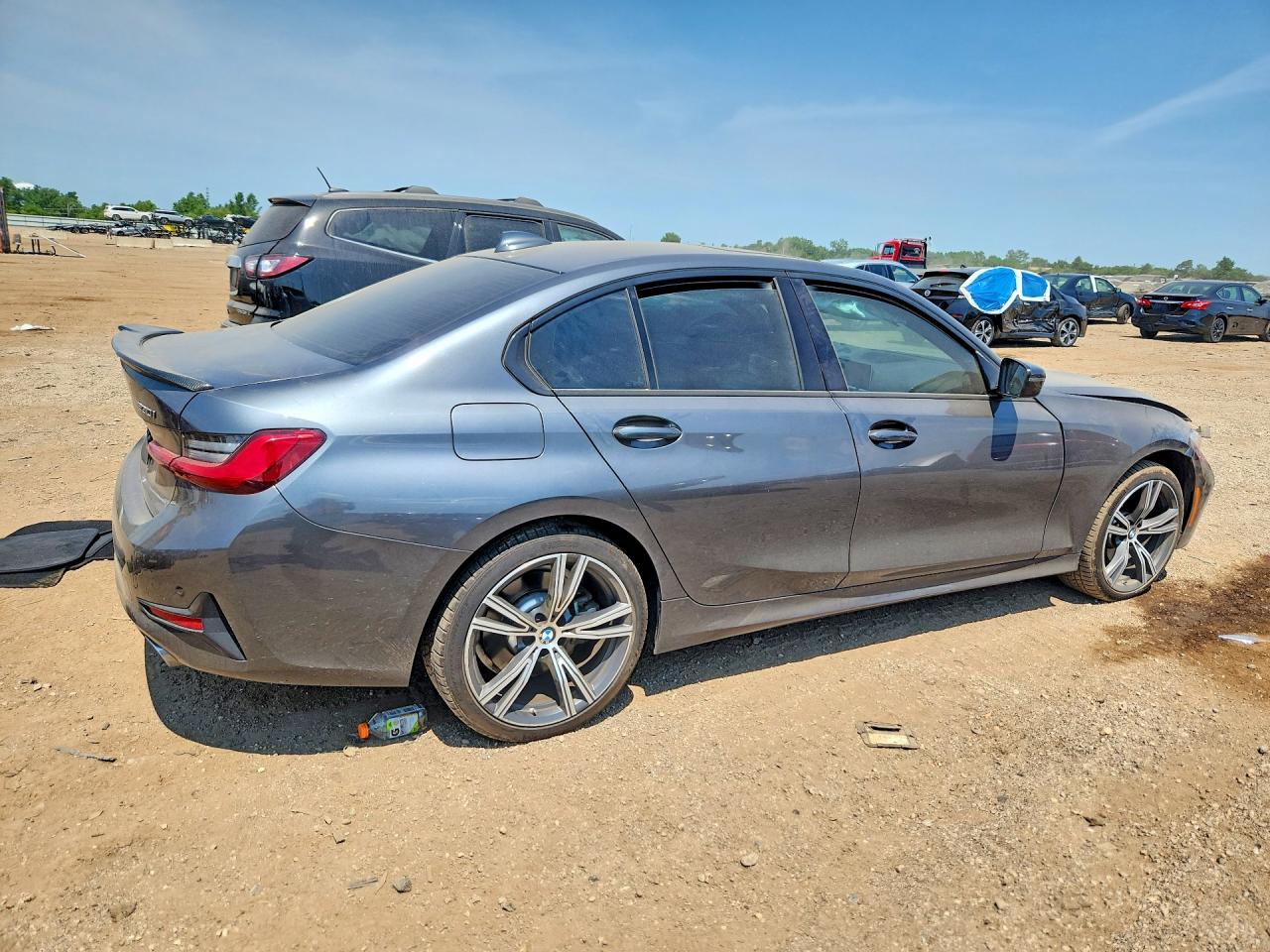 WBA5R7C0XMFK58736 · 2021 BMW 330XI · 3/12