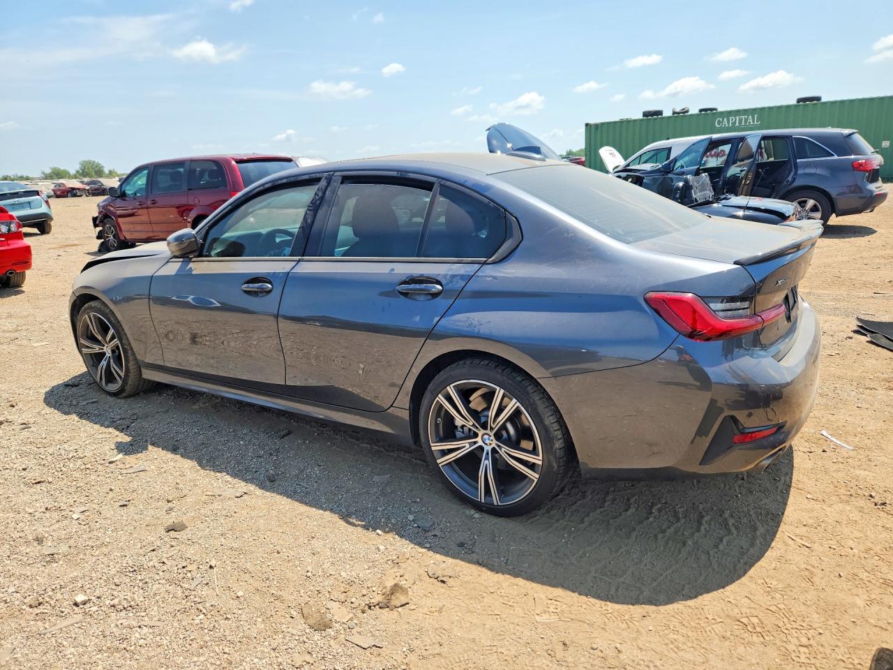 WBA5R7C0XMFK58736 · 2021 BMW 330XI · 2/12