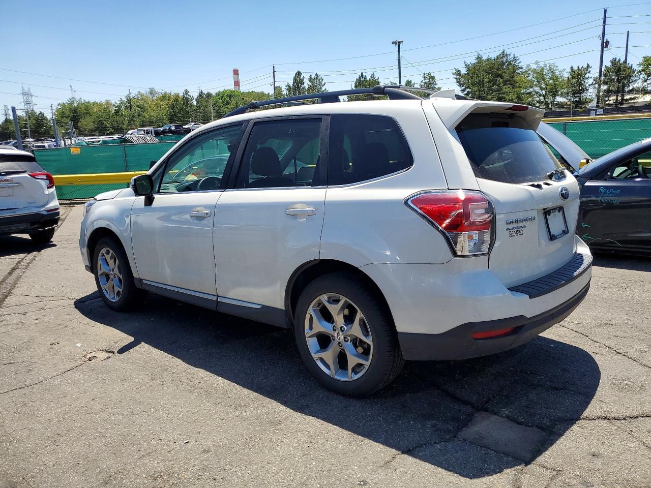 JF2SJAWC9JH503768 · 2018 SUBARU FORESTER · 2/12