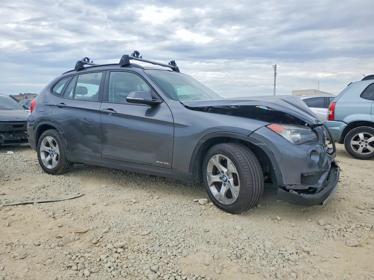 WBAVM1C54EVW49184 · 2014 BMW X1 · 4/13