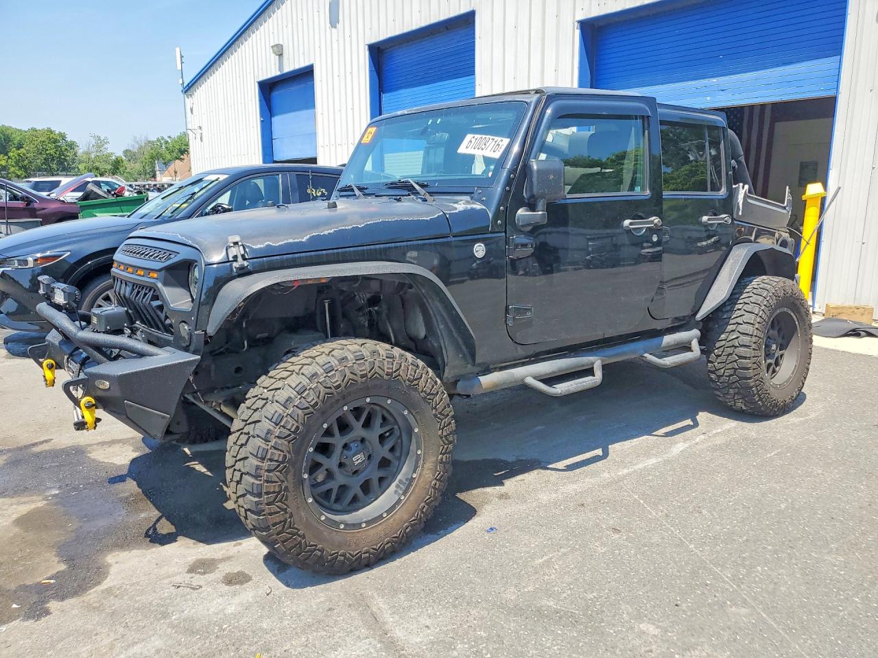 1J4BA3H17BL609585 · 2011 JEEP WRANGLER UNLIMITED