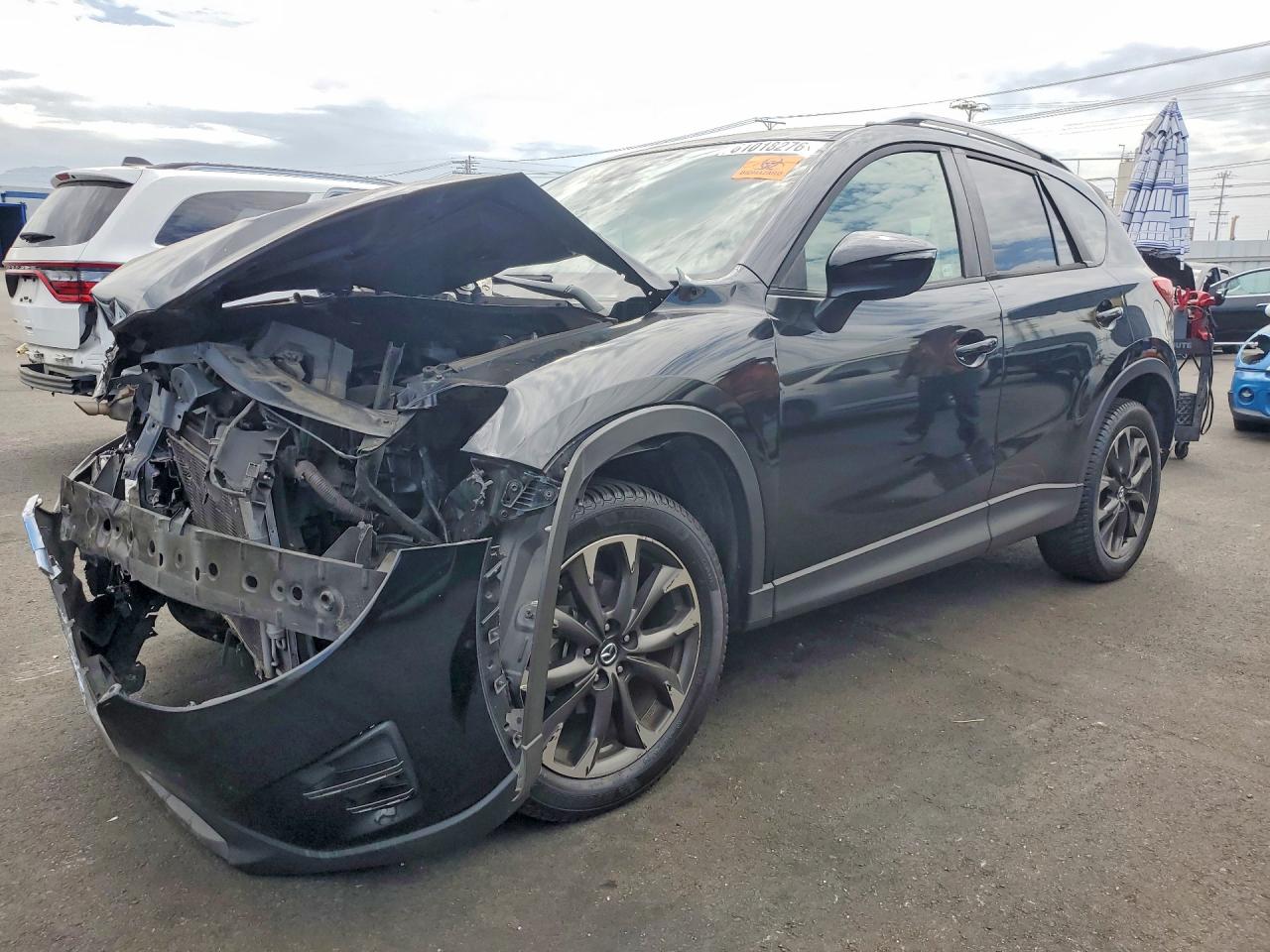 JM3KE2DY1G0840120 · 2016 MAZDA CX-5