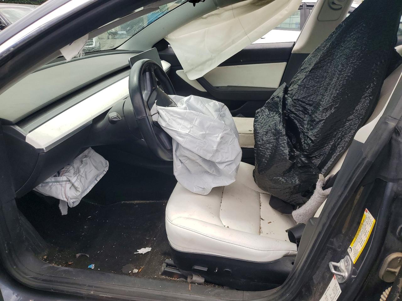 5YJ3E1EB9JF147287 · 2018 TESLA MODEL 3 · 7/12