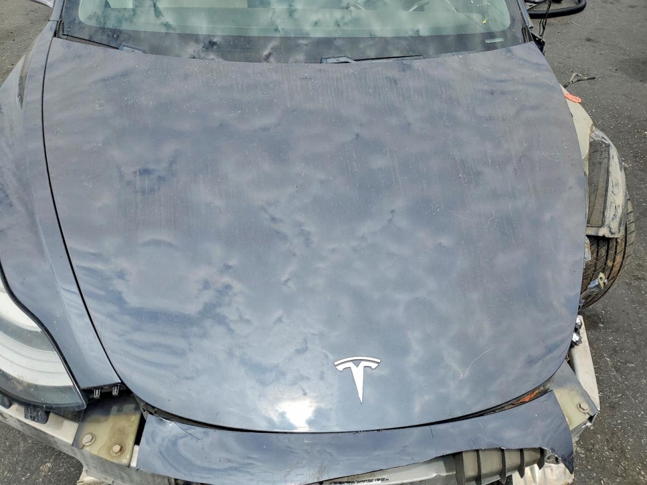 5YJ3E1EB9JF147287 · 2018 TESLA MODEL 3 · 11/12