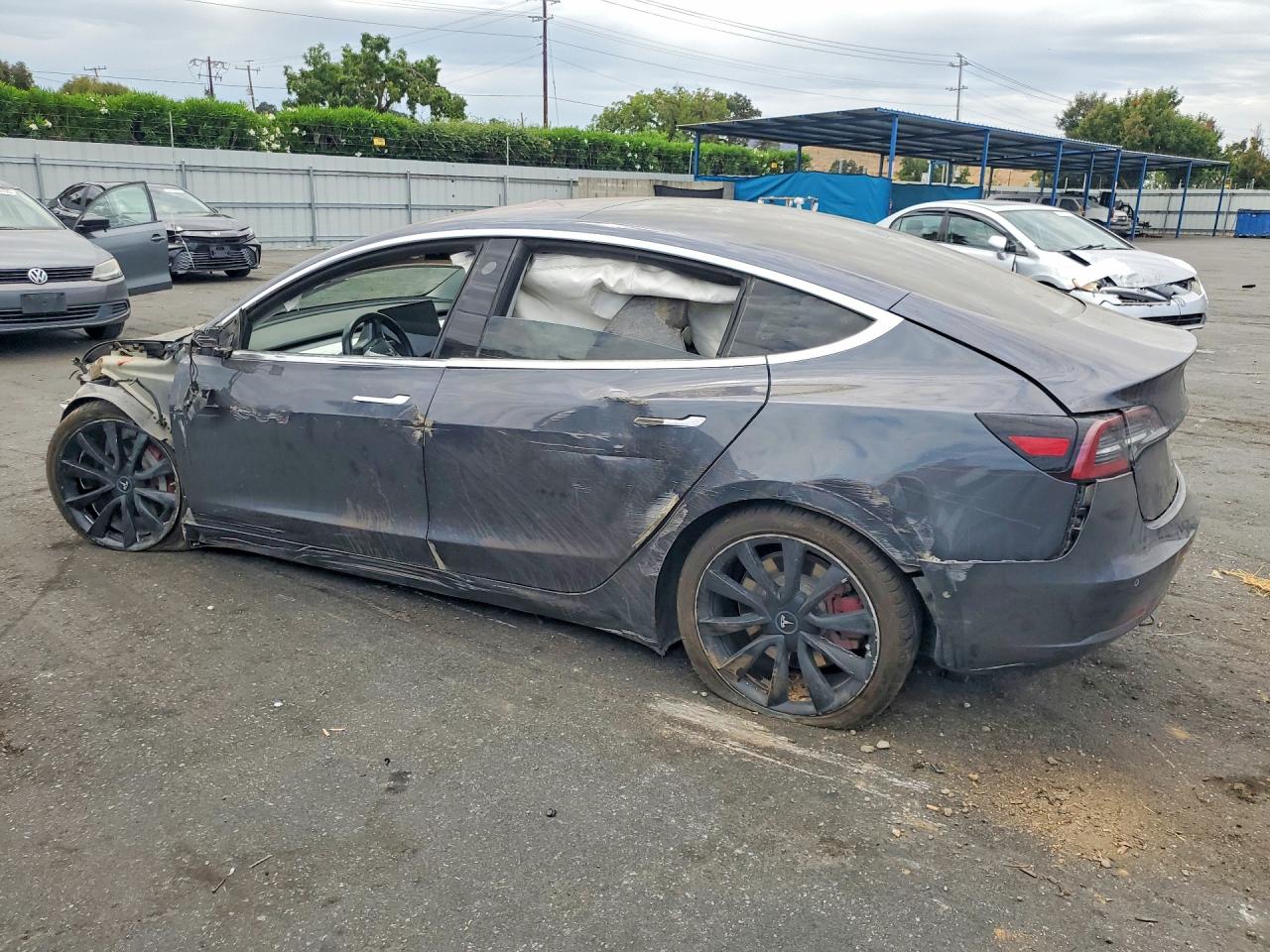 5YJ3E1EB9JF147287 · 2018 TESLA MODEL 3 · 2/12