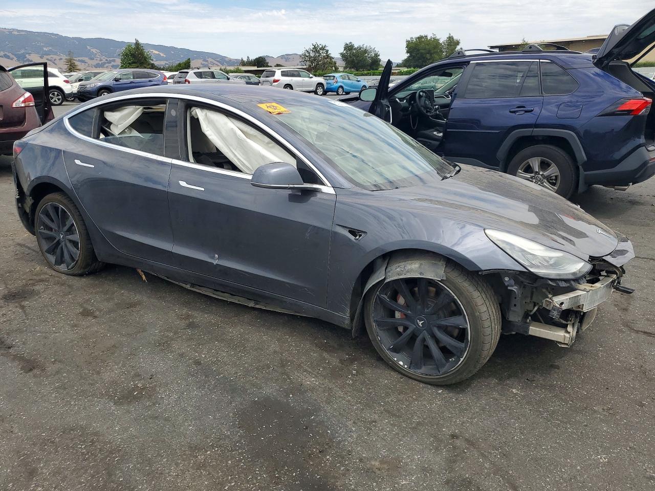 5YJ3E1EB9JF147287 · 2018 TESLA MODEL 3 · 4/12