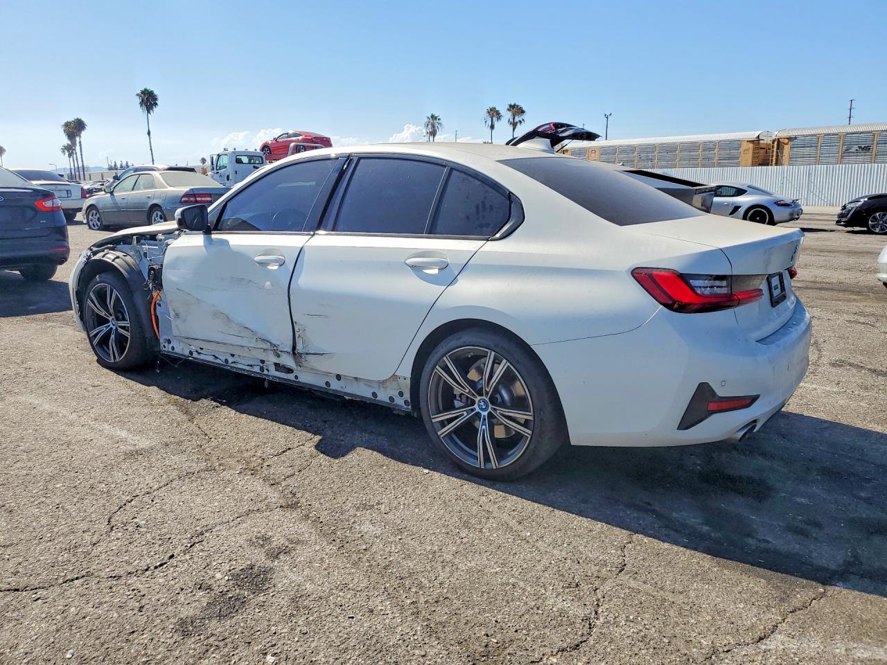 WBA5P7C09NFL66269 · 2022 BMW 330E · 2/13