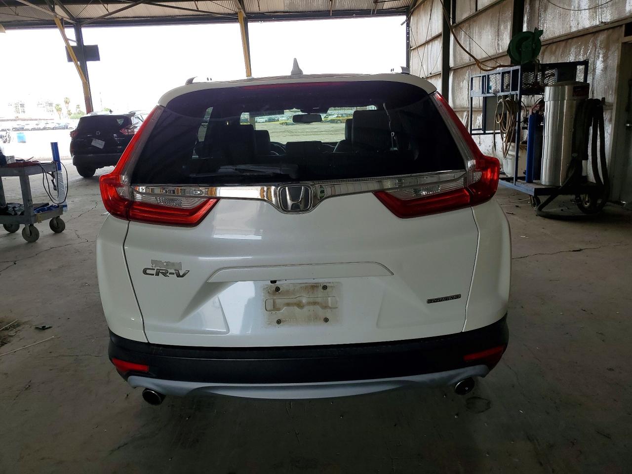 5J6RW1H99JL010759 · 2018 HONDA CR-V · 6/12
