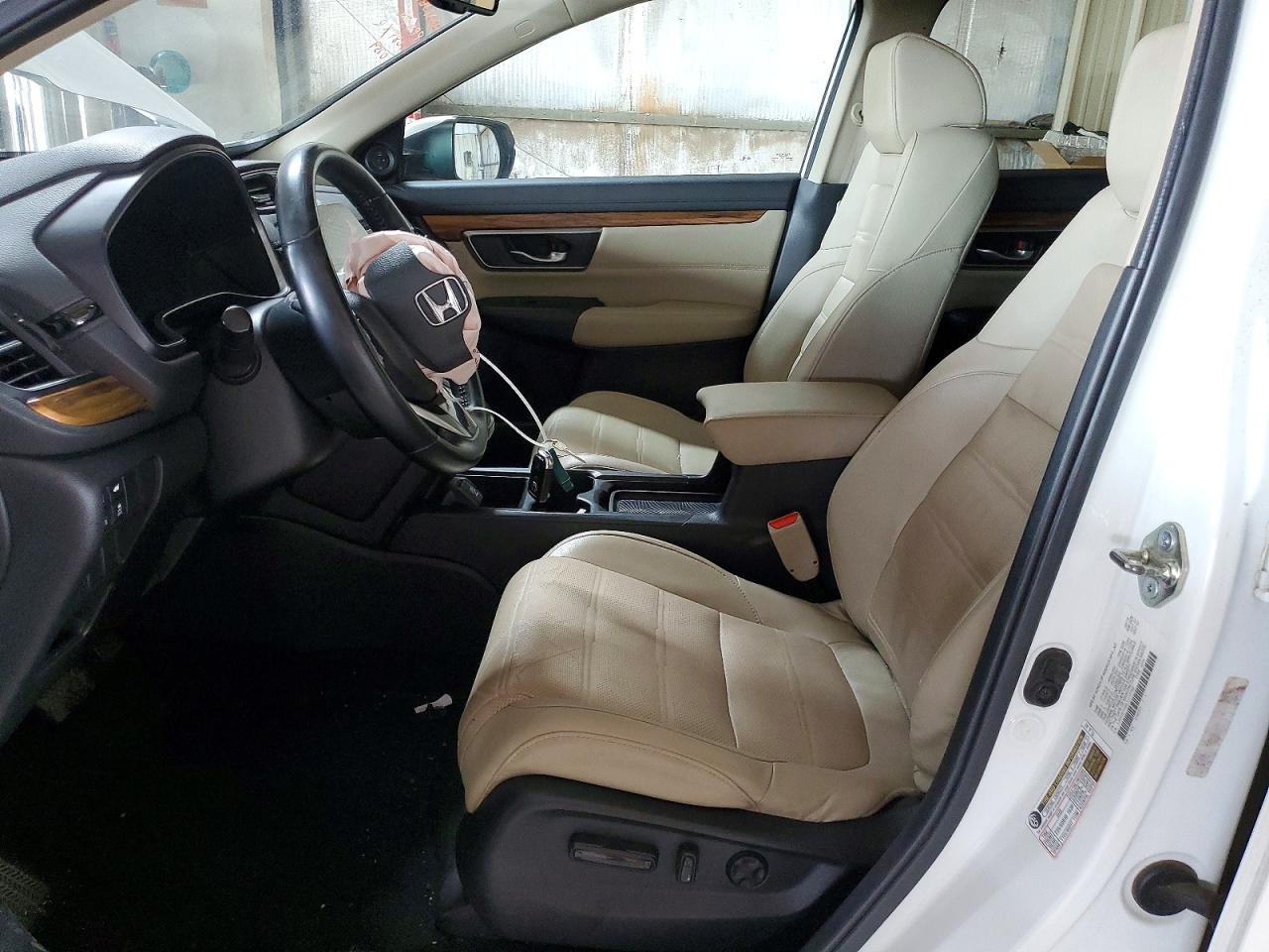 5J6RW1H99JL010759 · 2018 HONDA CR-V · 7/12