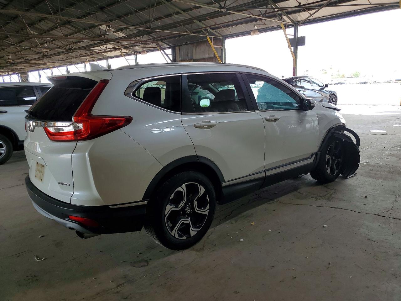 5J6RW1H99JL010759 · 2018 HONDA CR-V · 3/12