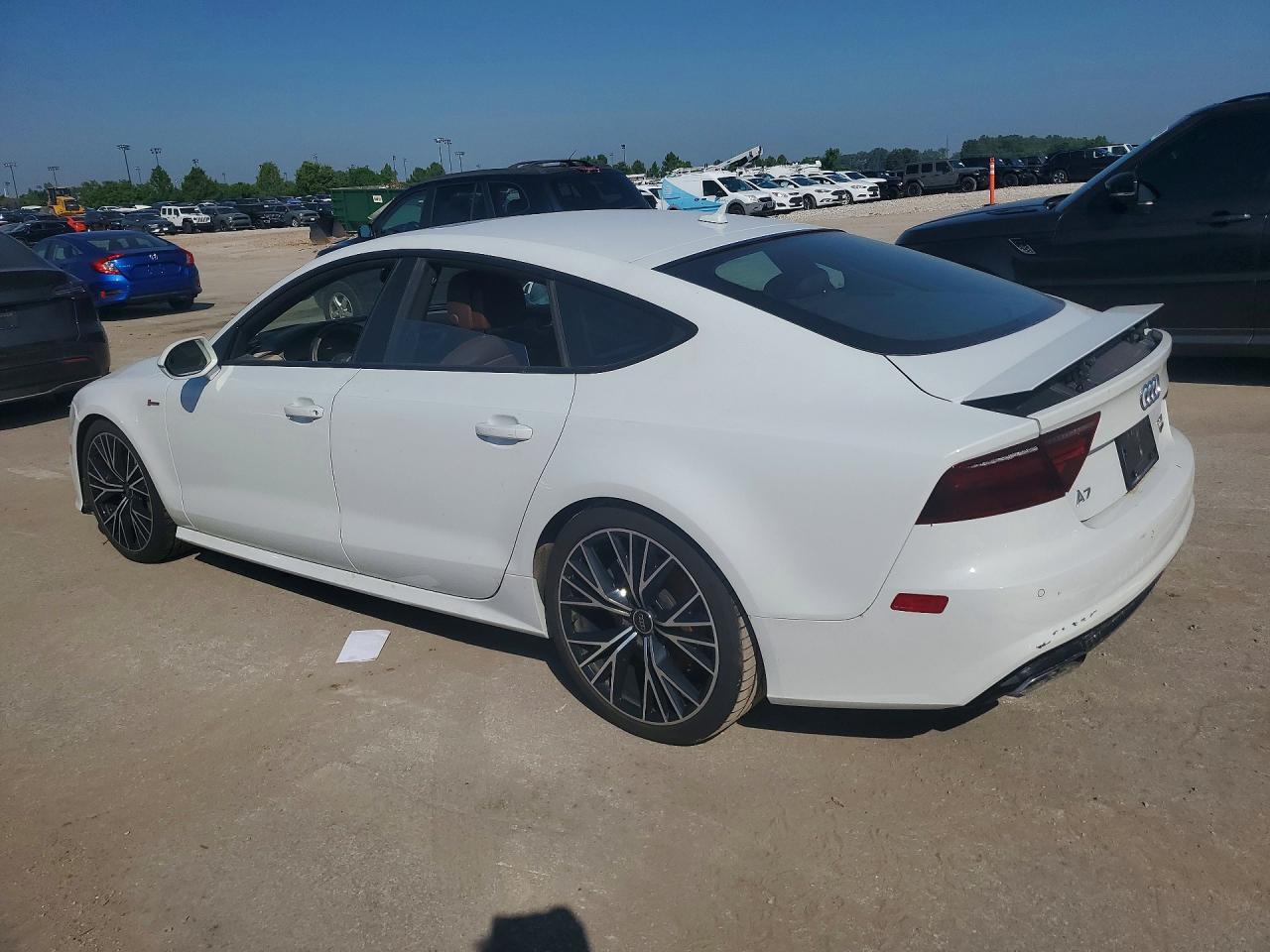 WAU23BFC5JN093077 · 2018 AUDI A7 · 2/12