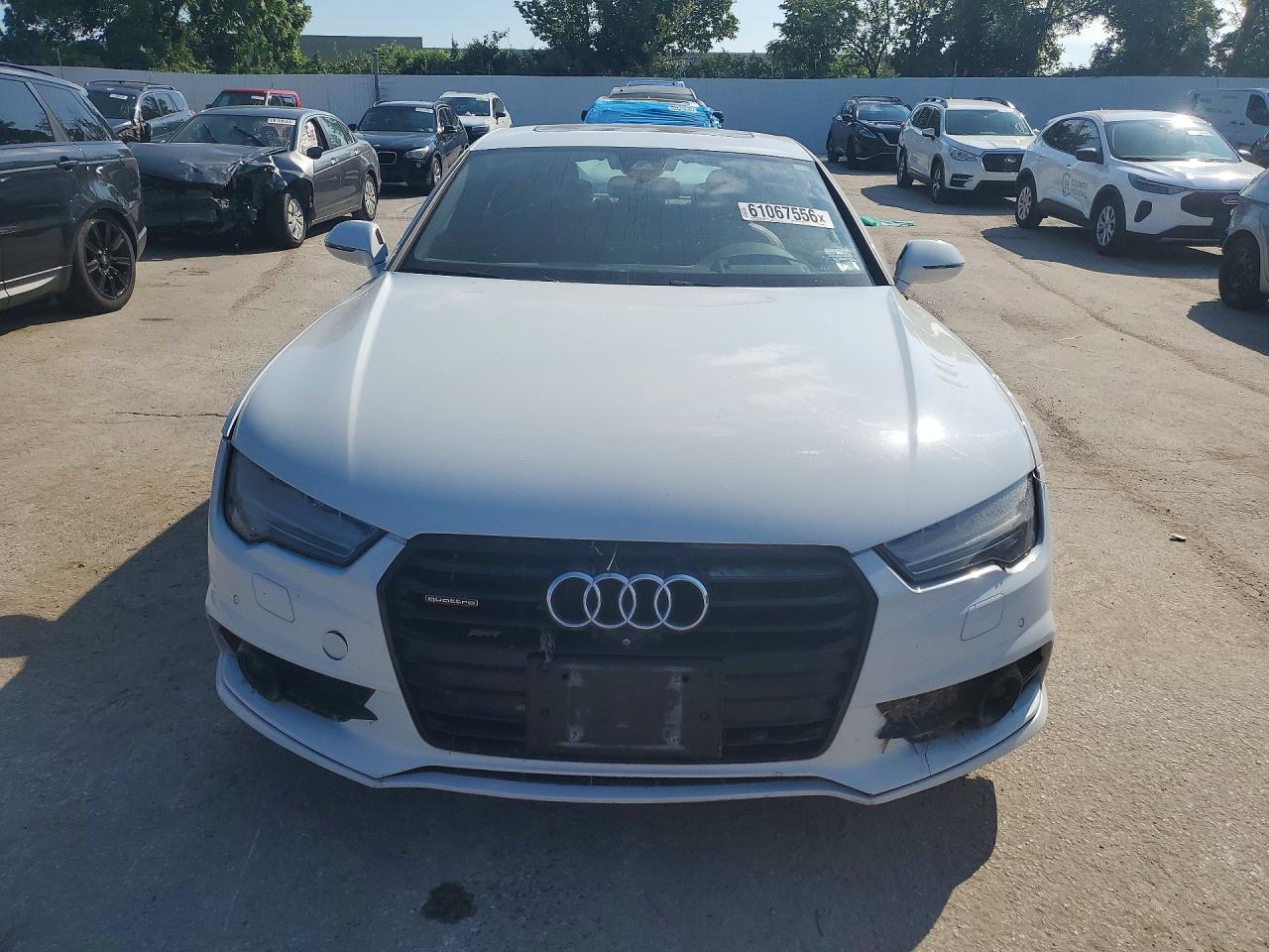 WAU23BFC5JN093077 · 2018 AUDI A7 · 5/12