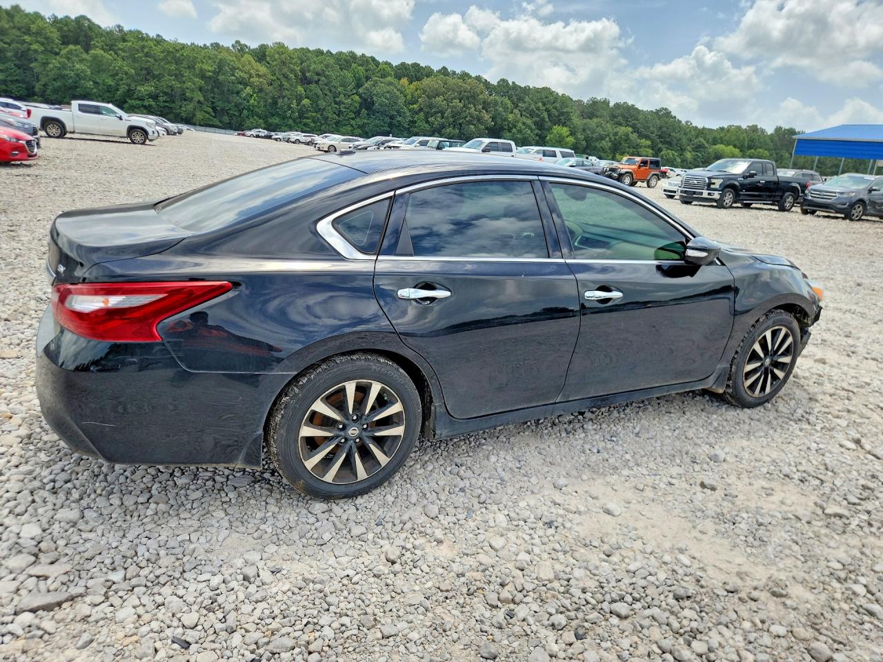 1N4AL3AP8JC200459 · 2018 NISSAN ALTIMA · 3/11