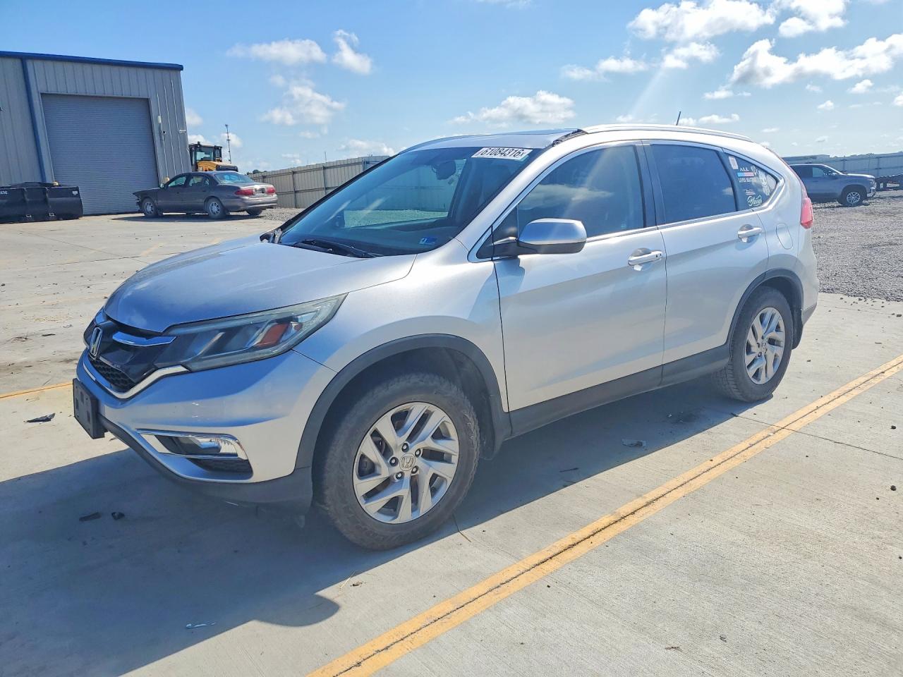 2HKRM4H74FH615859 · 2015 HONDA CR-V