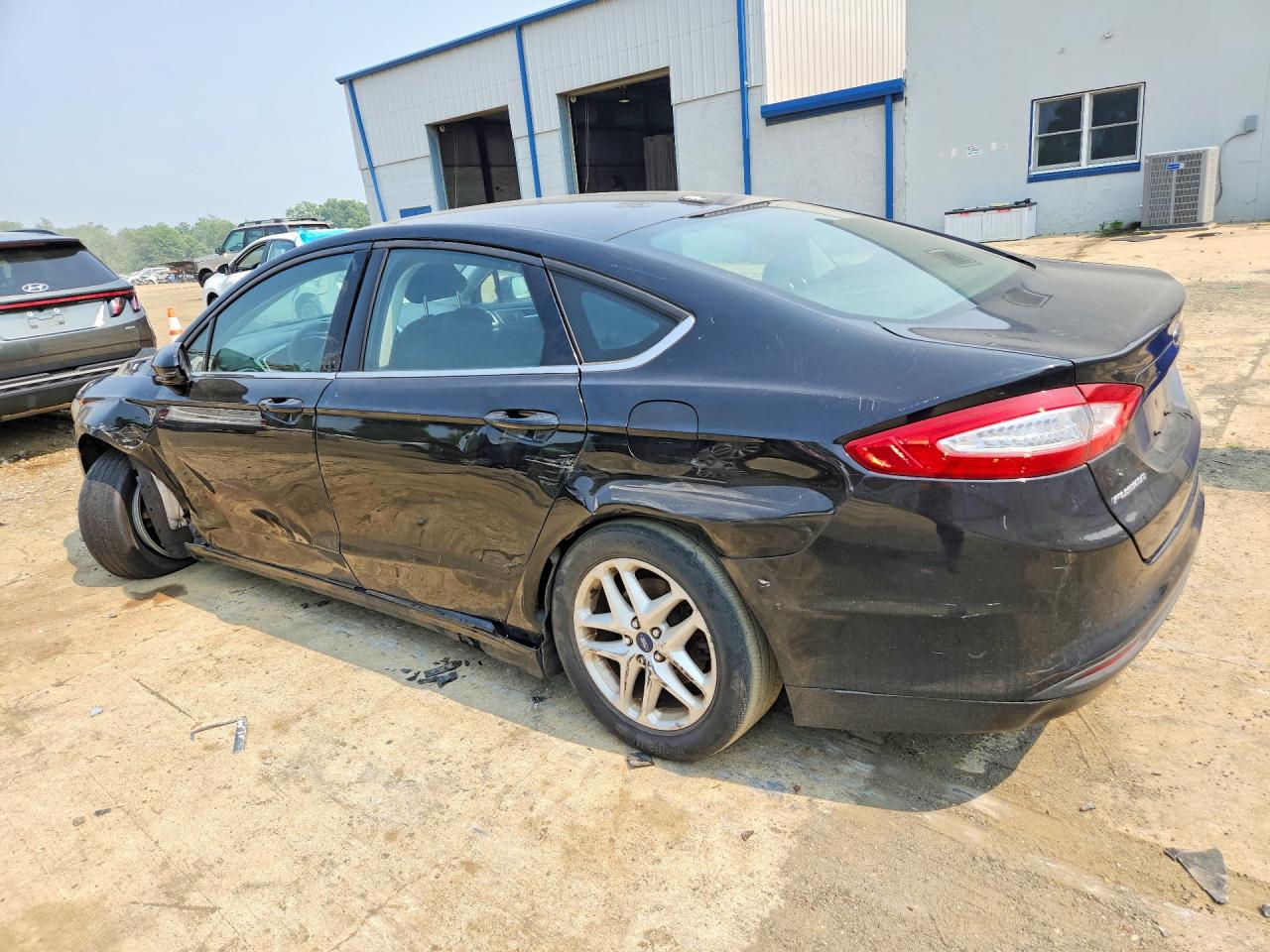 3FA6P0H79GR209390 · 2016 FORD FUSION · 2/12