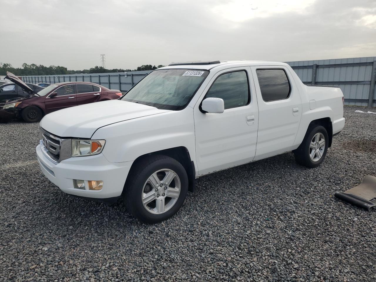 5FPYK1F57BB454103 · 2011 HONDA RIDGELINE
