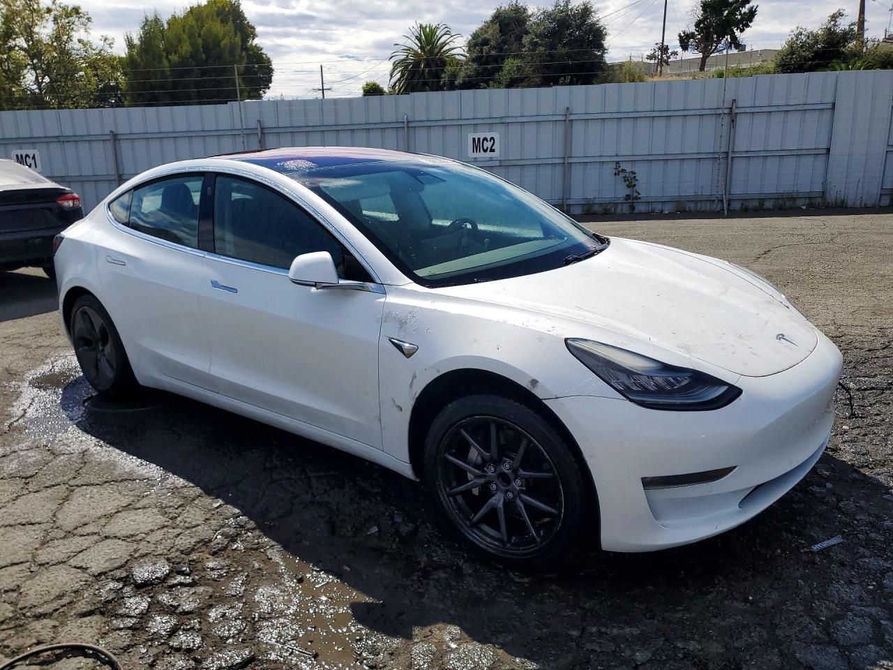 5YJ3E1EA1JF013218 · 2018 TESLA MODEL 3 · 4/12