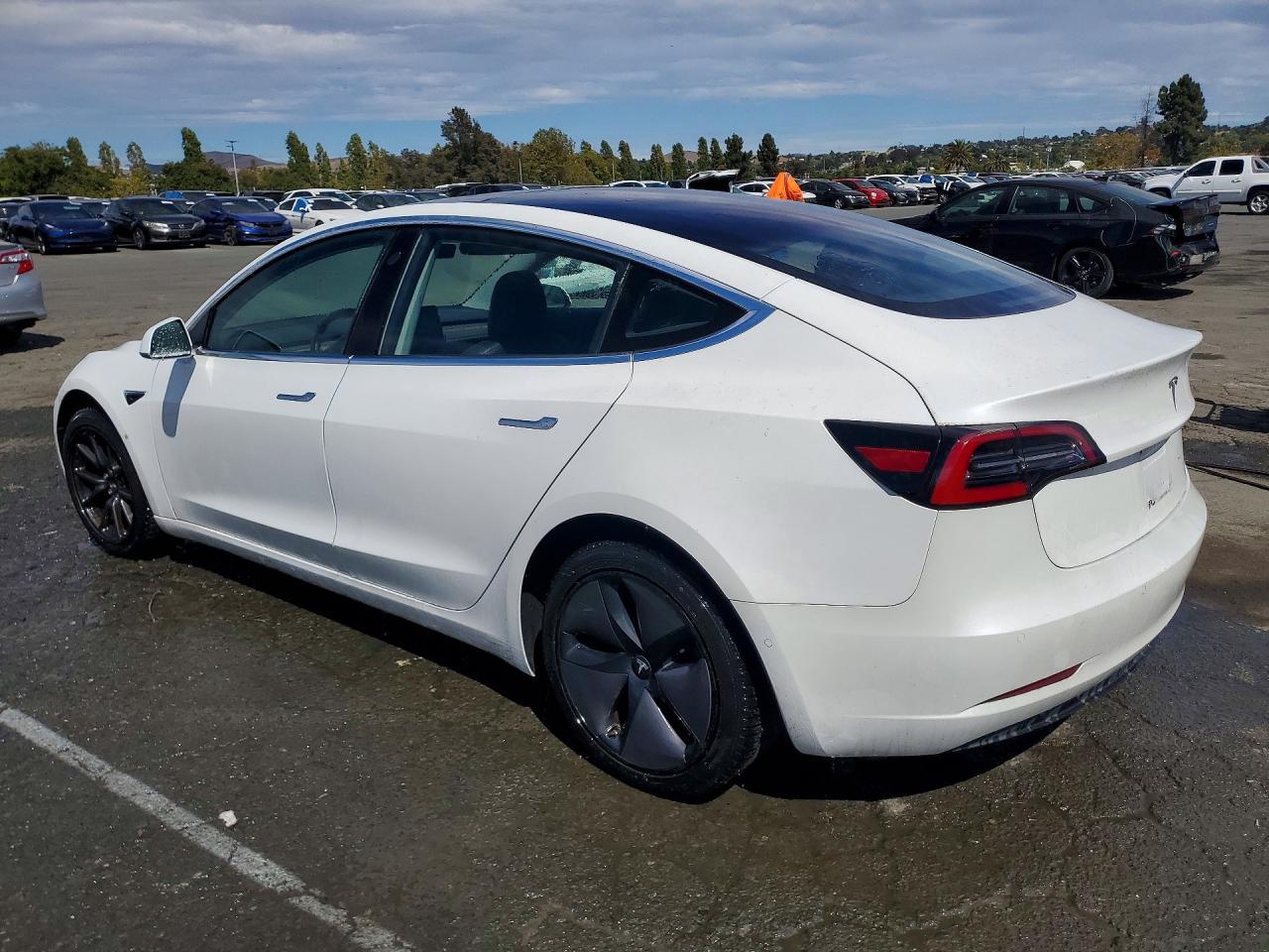 5YJ3E1EA1JF013218 · 2018 TESLA MODEL 3 · 2/12