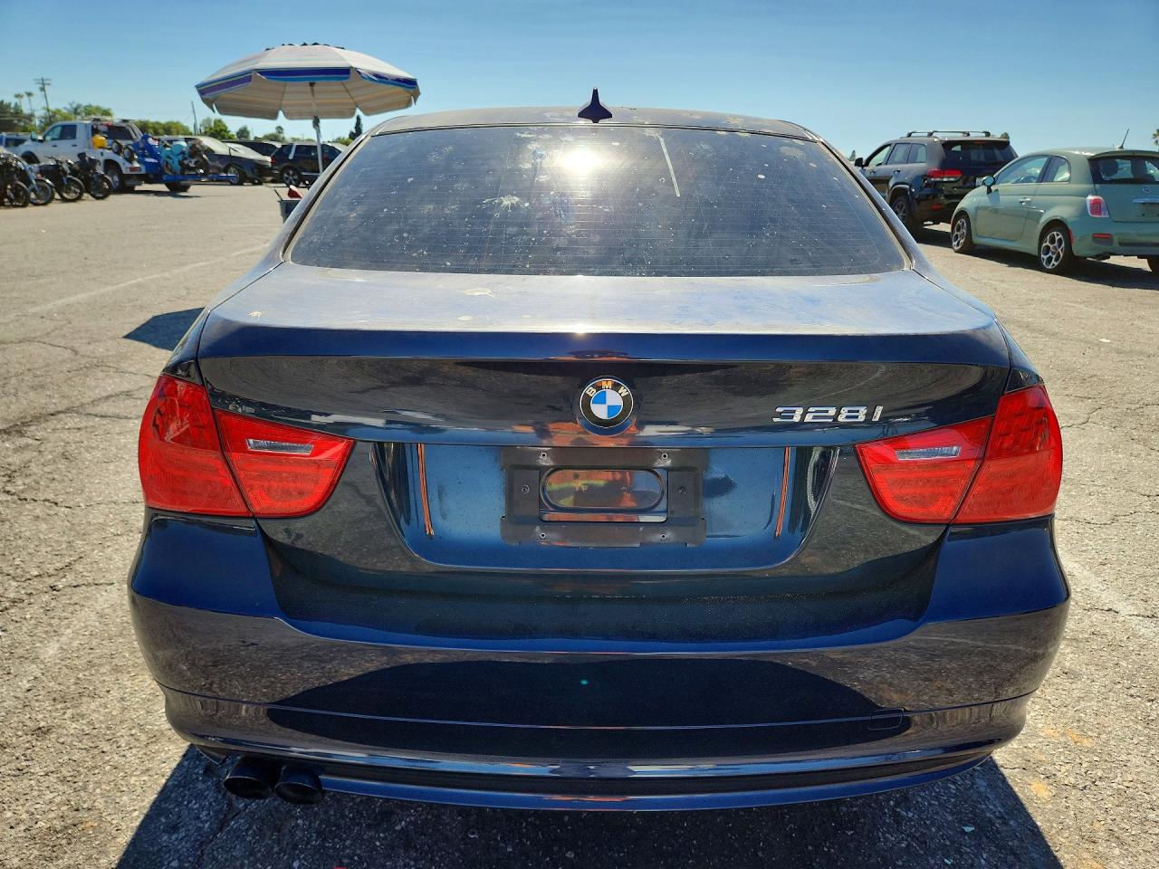WBAPH53509A437304 · 2009 BMW 328 · 6/12