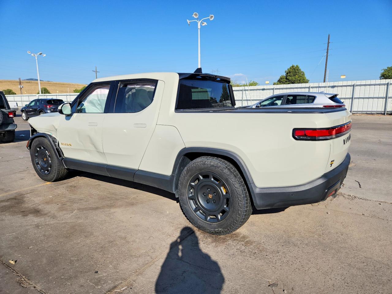 7FCTGCAA1SN041349 · 2025 RIVIAN R1T · 2/12