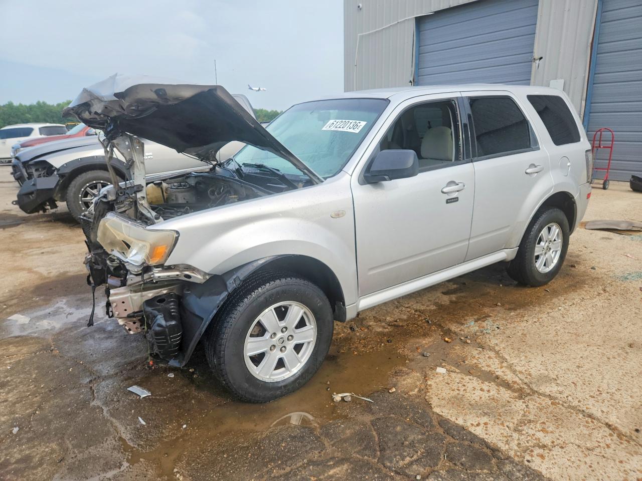 4M2CU81769KJ26600 · 2009 MERCURY MARINER