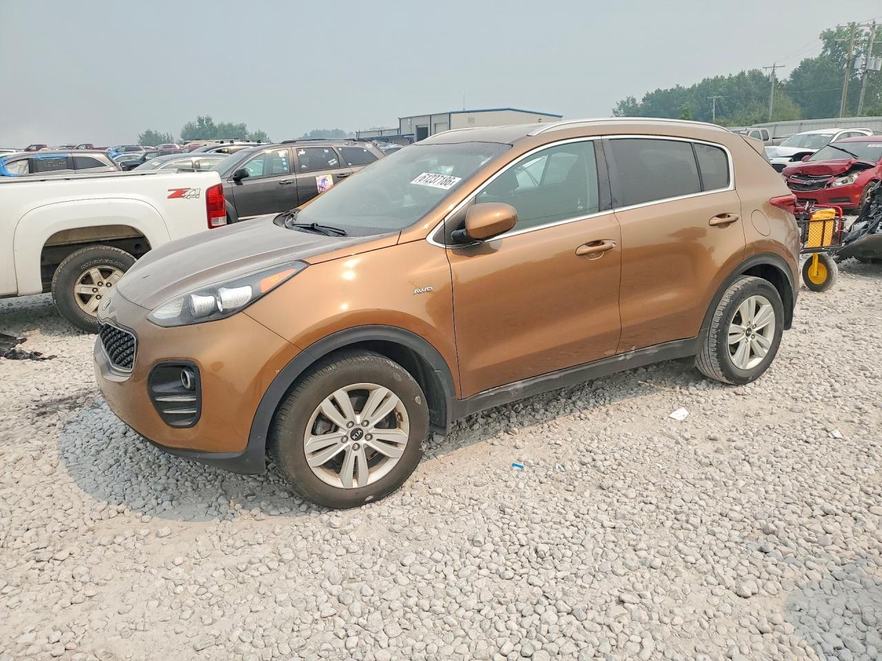 KNDPMCAC4H7261423 · 2017 KIA SPORTAGE