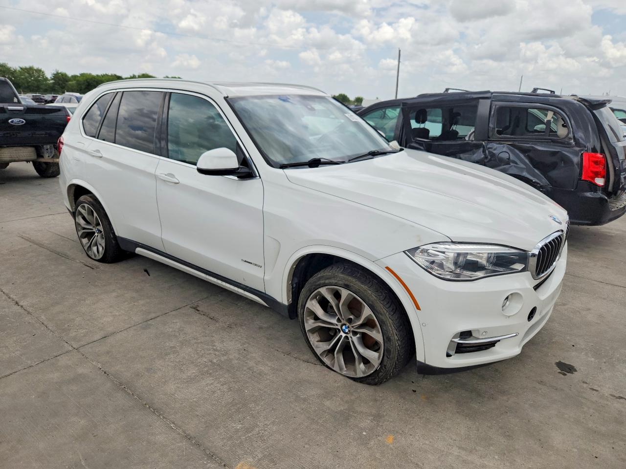 5UXKR2C53J0X10334 · 2018 BMW X5 · 4/12