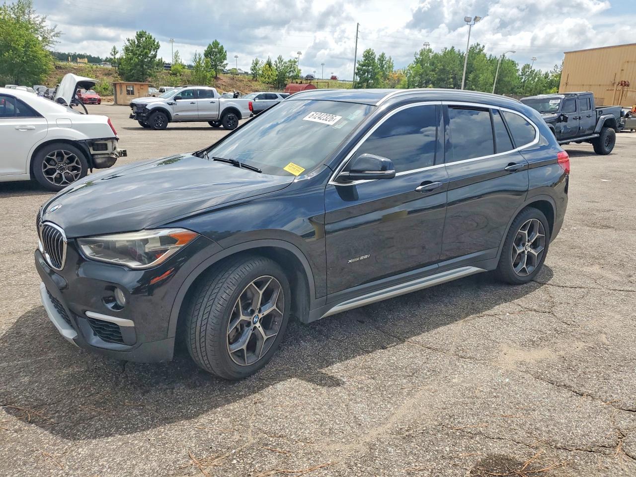 WBXHT3Z31G4A48138 · 2016 BMW X1