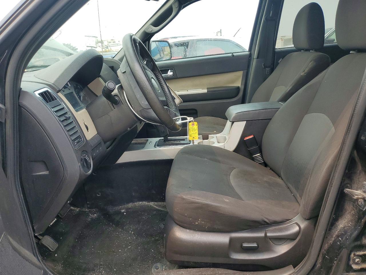4M2CN8B7XBKJ06089 · 2011 MERCURY MARINER · 7/14