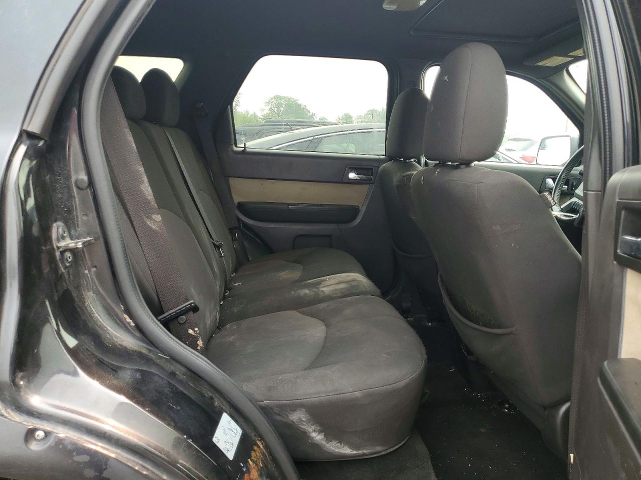 4M2CN8B7XBKJ06089 · 2011 MERCURY MARINER · 11/14