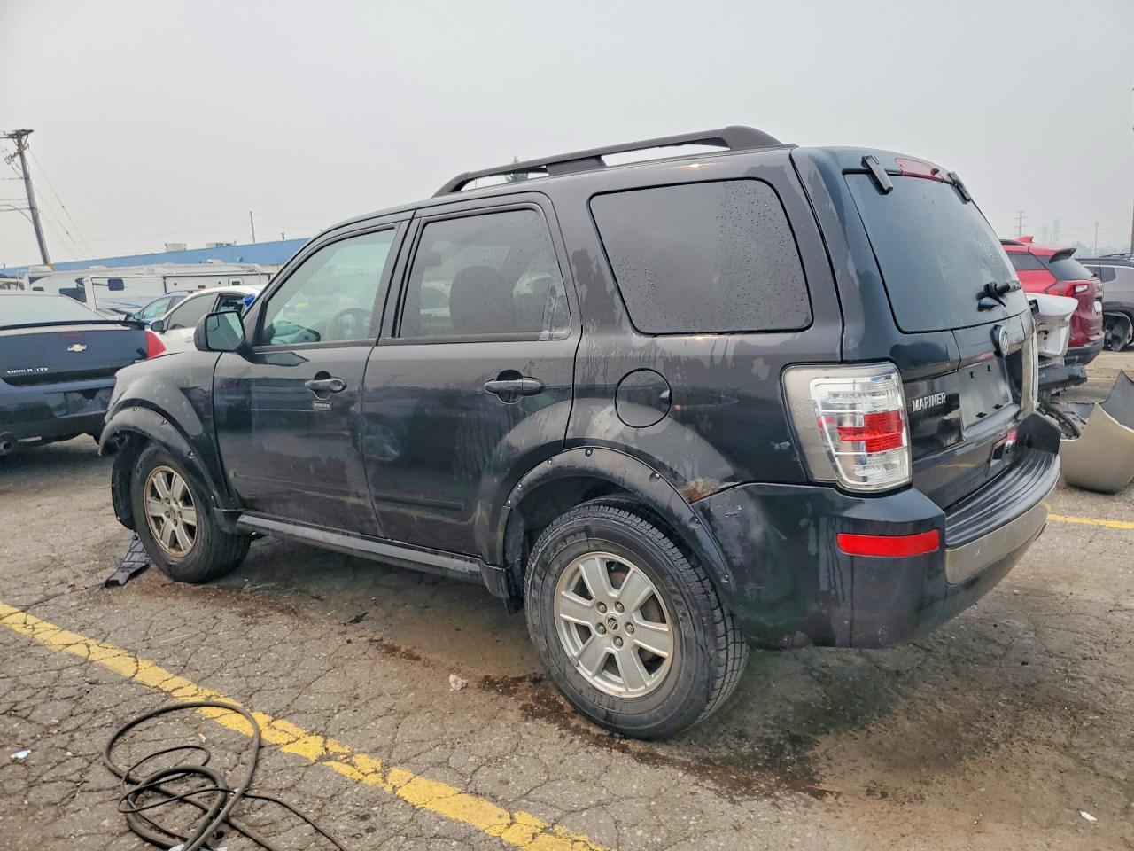4M2CN8B7XBKJ06089 · 2011 MERCURY MARINER · 2/14