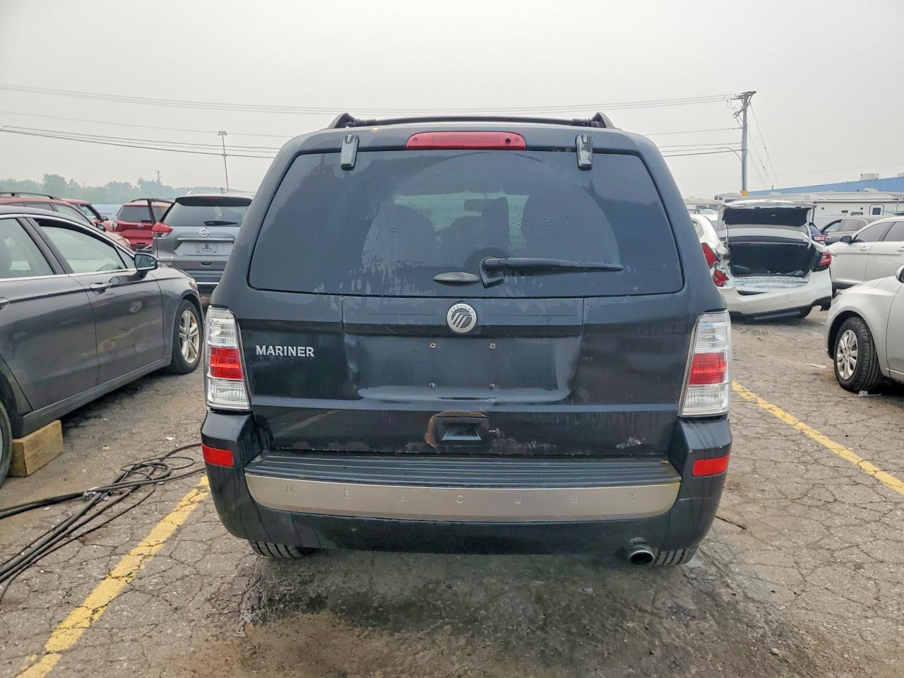 4M2CN8B7XBKJ06089 · 2011 MERCURY MARINER · 6/14