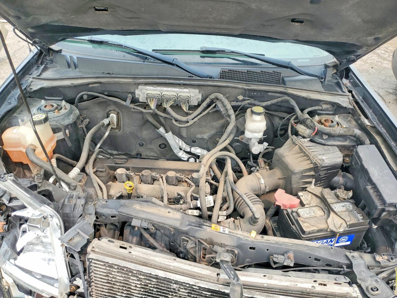 4M2CN8B7XBKJ06089 · 2011 MERCURY MARINER · 12/14