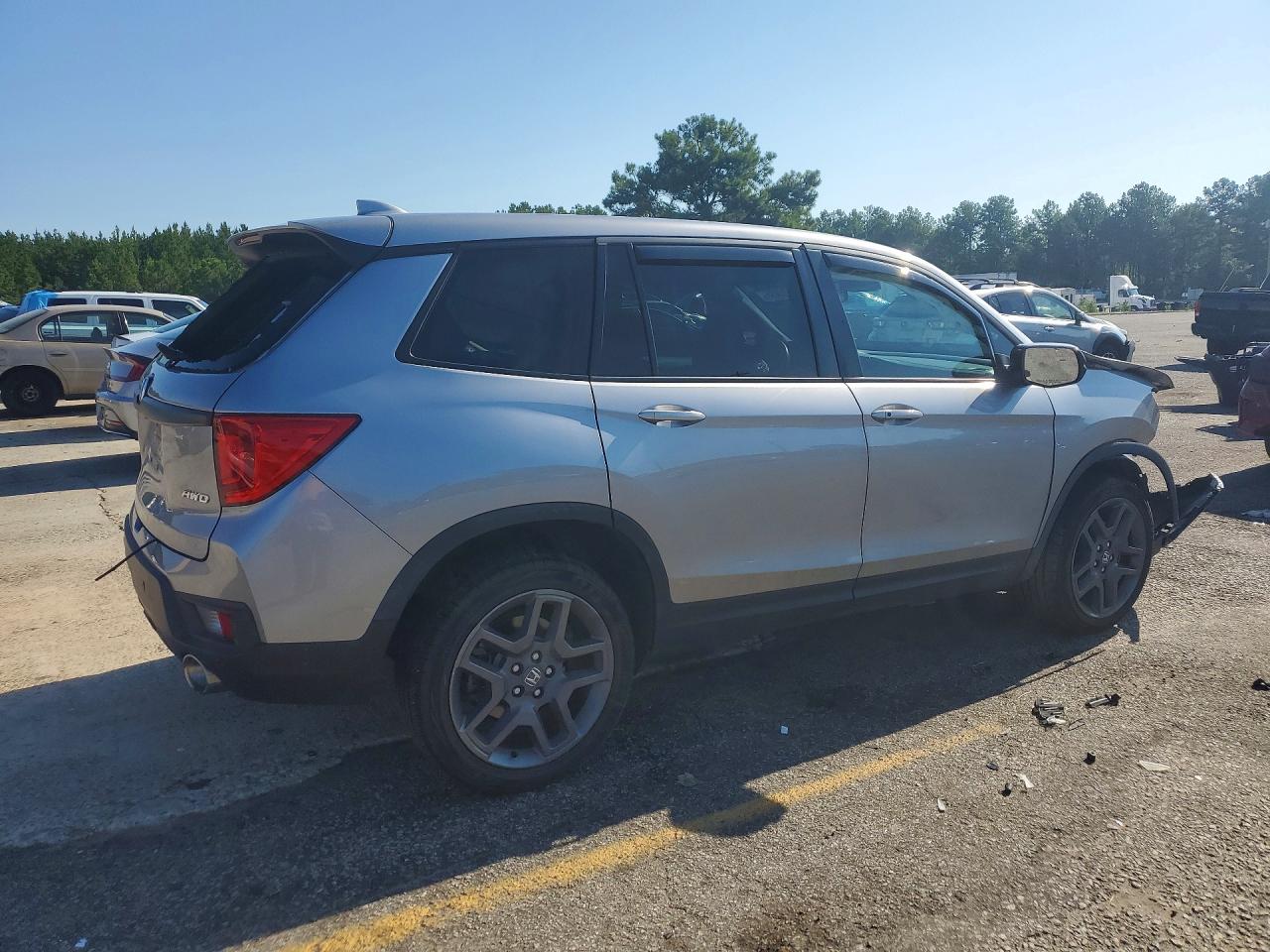 5FNYF8H51PB008670 · 2023 HONDA PASSPORT · 3/12