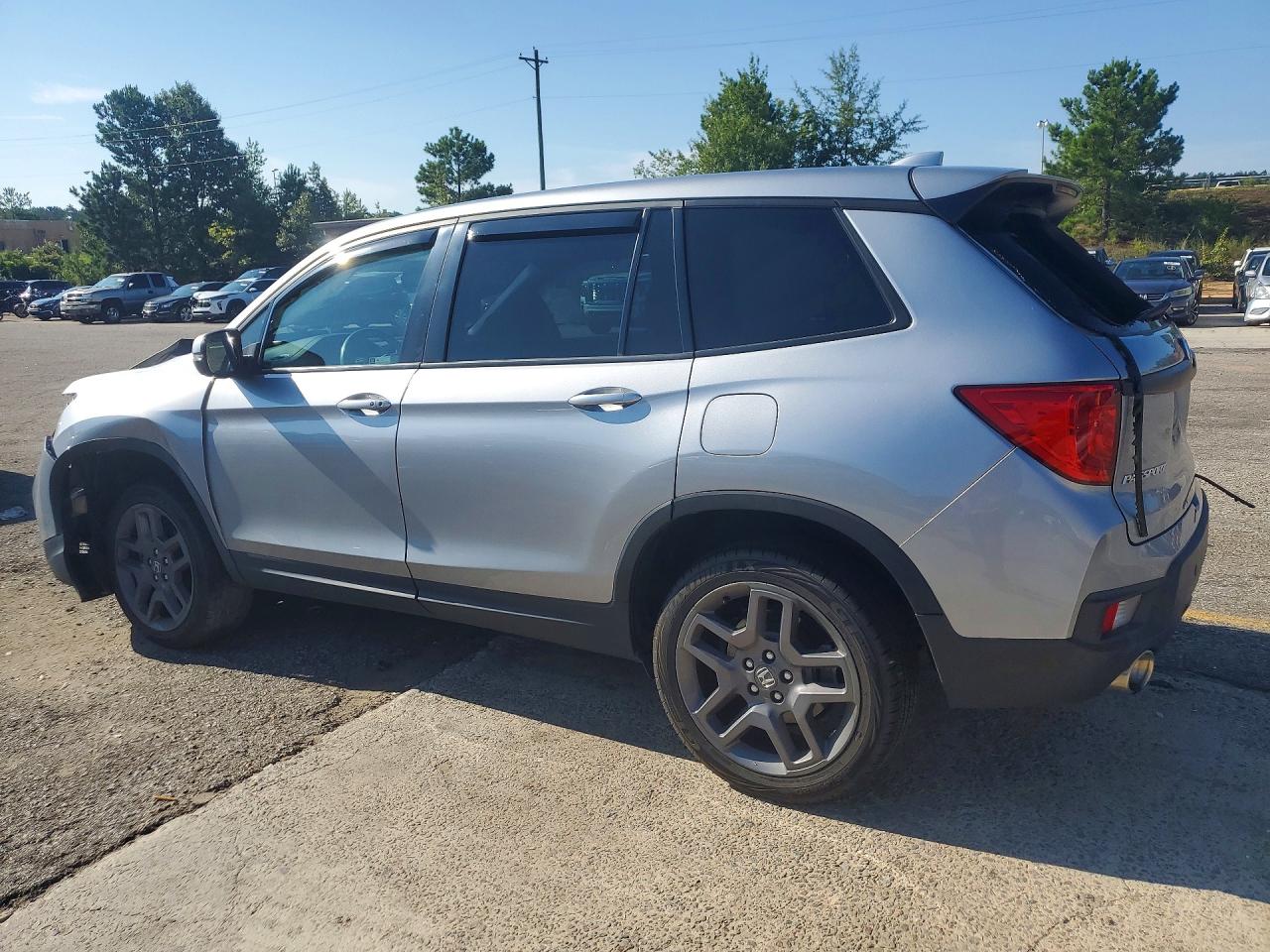 5FNYF8H51PB008670 · 2023 HONDA PASSPORT · 2/12