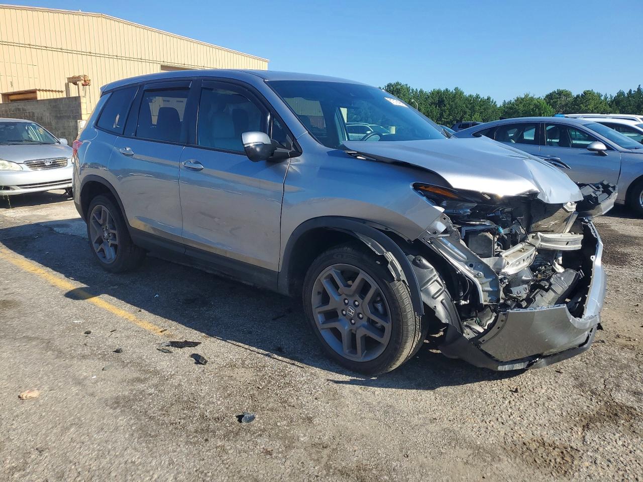 5FNYF8H51PB008670 · 2023 HONDA PASSPORT · 4/12