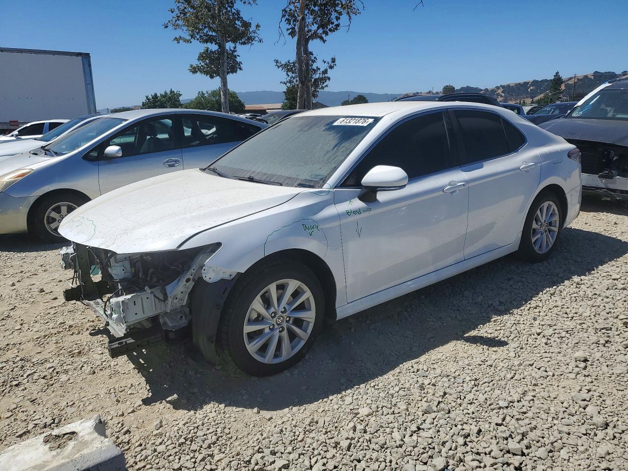 4T1R11AK0NU692055 · 2022 TOYOTA CAMRY
