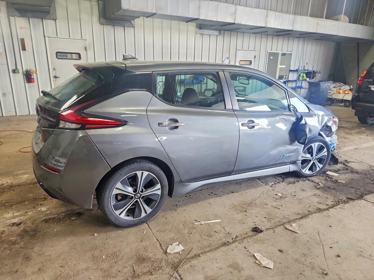1N4AZ1CP5JC300616 · 2018 NISSAN LEAF · 3/14