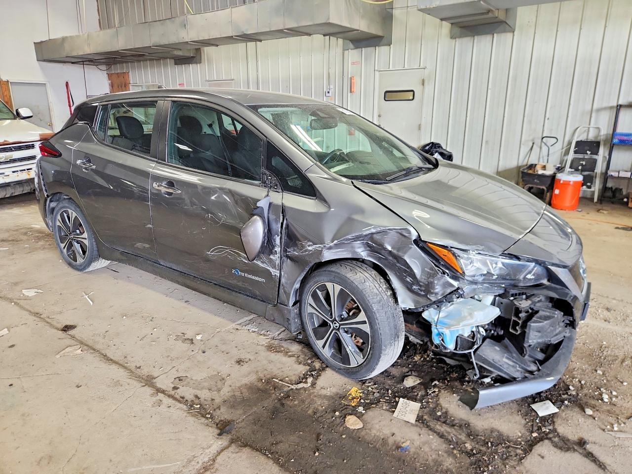 1N4AZ1CP5JC300616 · 2018 NISSAN LEAF · 4/14