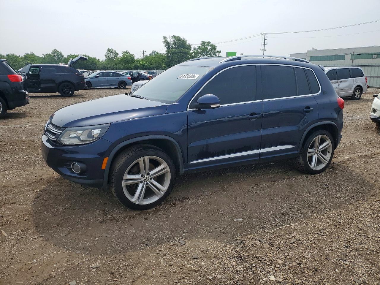 WVGBV3AX3EW044064 · 2014 VOLKSWAGEN TIGUAN