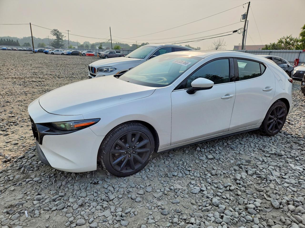 JM1BPBML1M1401674 · 2021 MAZDA 3