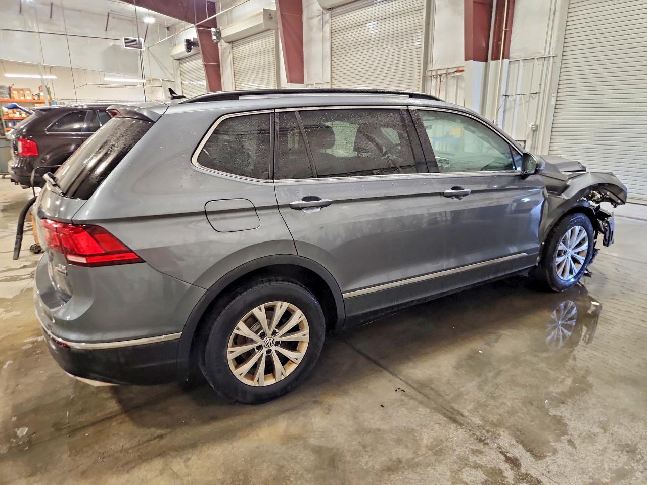 3VV2B7AX1JM105962 · 2018 VOLKSWAGEN TIGUAN · 3/14