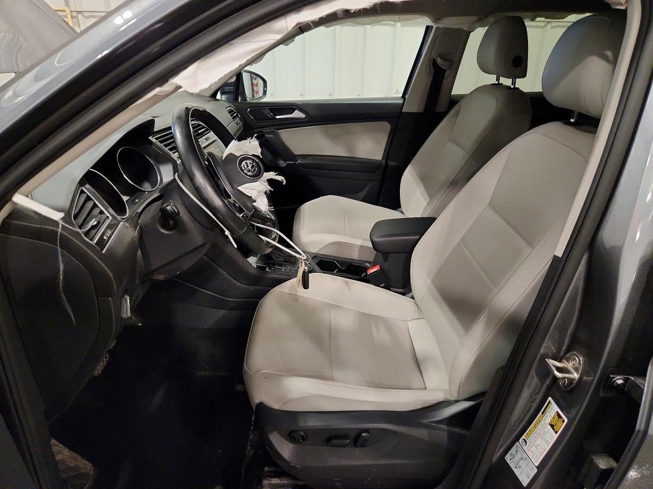 3VV2B7AX1JM105962 · 2018 VOLKSWAGEN TIGUAN · 7/14