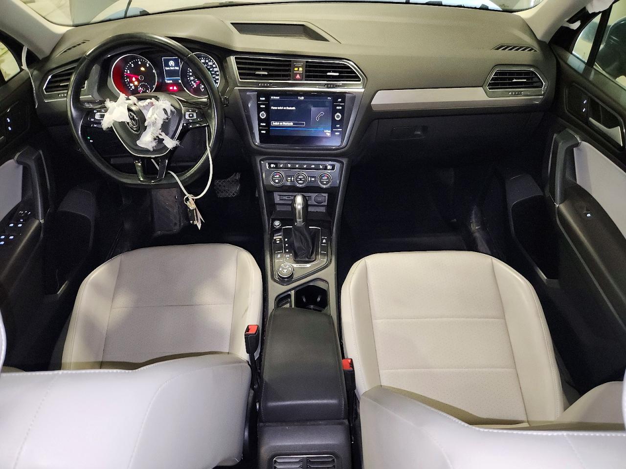 3VV2B7AX1JM105962 · 2018 VOLKSWAGEN TIGUAN · 8/14