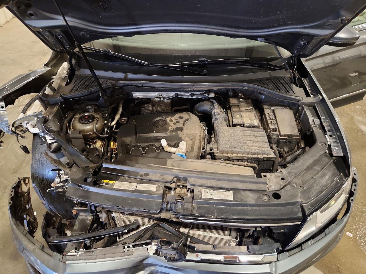 3VV2B7AX1JM105962 · 2018 VOLKSWAGEN TIGUAN · 12/14