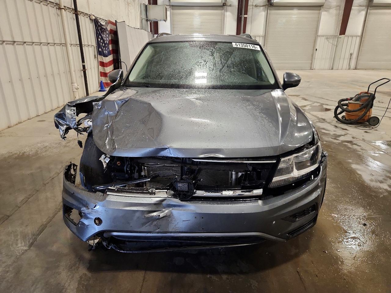 3VV2B7AX1JM105962 · 2018 VOLKSWAGEN TIGUAN · 5/14