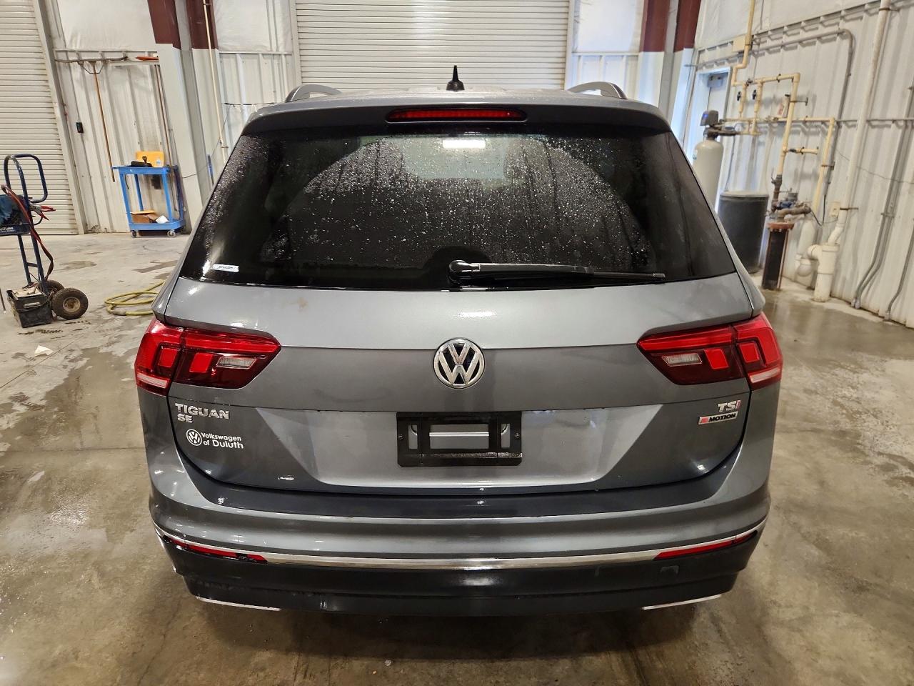 3VV2B7AX1JM105962 · 2018 VOLKSWAGEN TIGUAN · 6/14